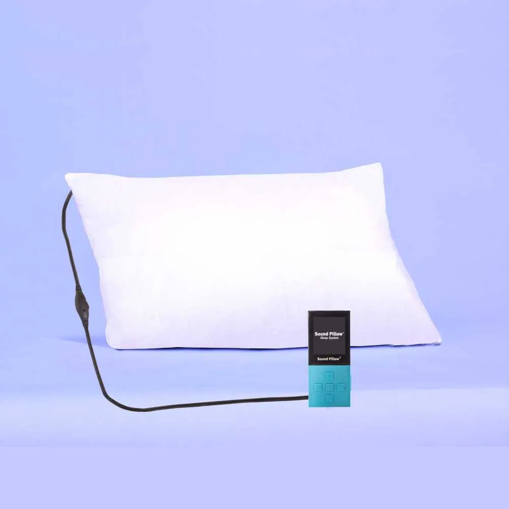 Sound Pillow with attached wired music player on a lilac background